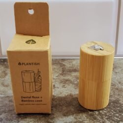 cornstarch dental floss in a Bamboo holder